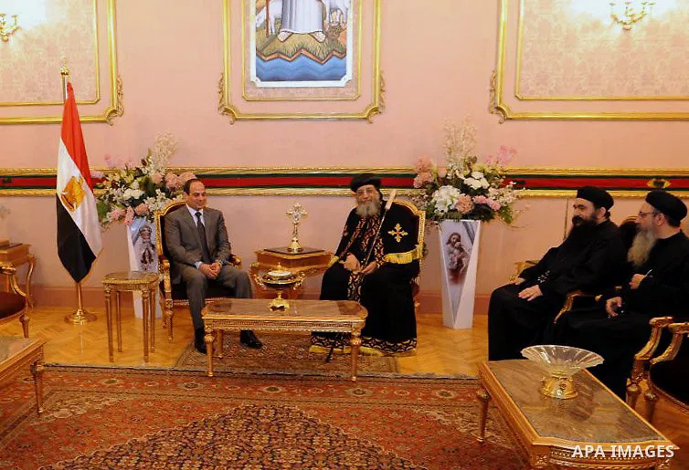 Egypt's former Defense minister Abdel Fattah al-Sissi meets for talks with Pope Tawadros II , leader of the Egyptian Coptic Orthodox Church, at the Coptic Cathedral of Saint Marcos, in Cairo, Egypt, 19 April 2014. Former...