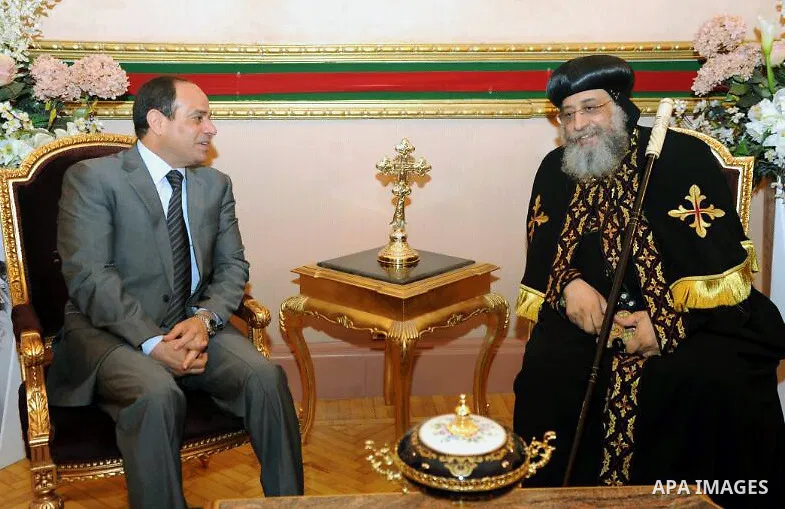 Egypt's former Defense minister Abdel Fattah al-Sissi meets for talks with Pope Tawadros II , leader of the Egyptian Coptic Orthodox Church, at the Coptic Cathedral of Saint Marcos, in Cairo, Egypt, 19 April 2014. Former...