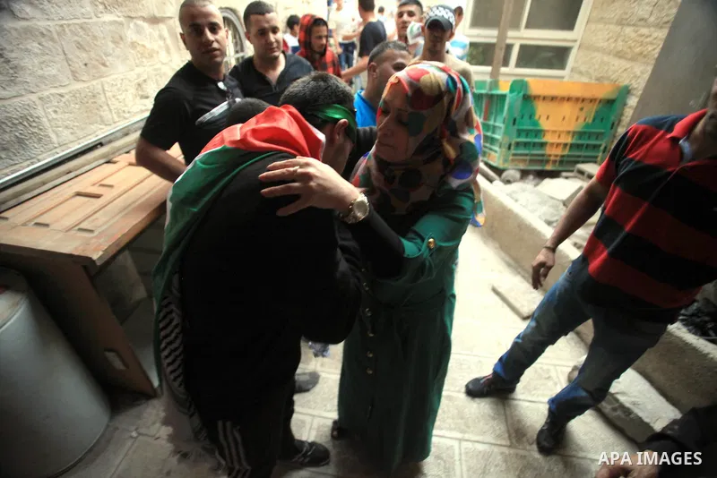 Palestinians celebrate the release of protesters detained by Israeli police during recent clashes at the Al-Aqsa mosque compound on April 27, 2014 in the Old City of Jerusalem. Israeli police arrested 16 Palestinians las...