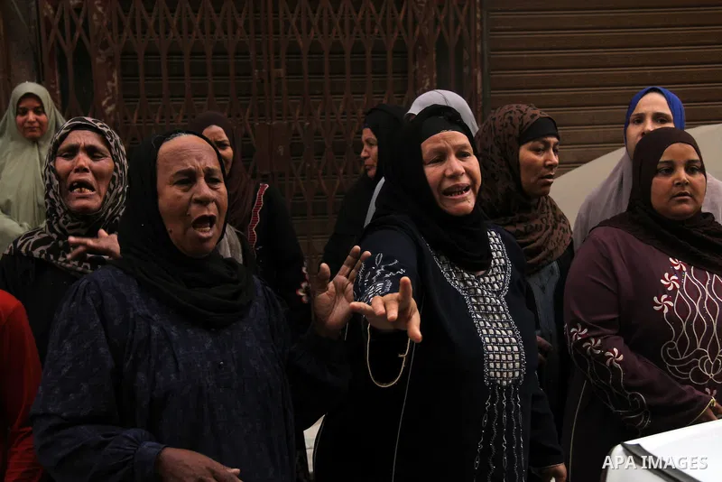 Relatives and families of members of Muslim Brotherhood and supporters of ousted President Mohamed Mursi react after hearing the sentence, in front of the court in Minya, south of Cairo, April 28, 2014. An Egyptian court...