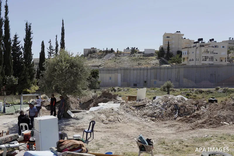 The remains of a Palestinian shed is seen following demolished by Israeli bulldozers, in al-Tur neighborhood, east Jerusalem on April 29, 2014. Israeli forces accompanied by bulldozers, stormed Al-Hardub neighborhood at...
