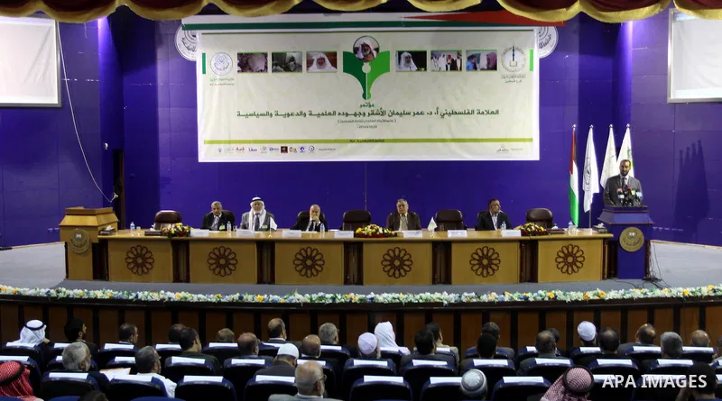 Palestinians attend a conference marking the second anniversary of Omar al-Ashqar death, at the Islamic University in Gaza City on April 29, 2014. Al-Ashqar was a student of scholars such as Ibn Baz and Al-Albani and he...