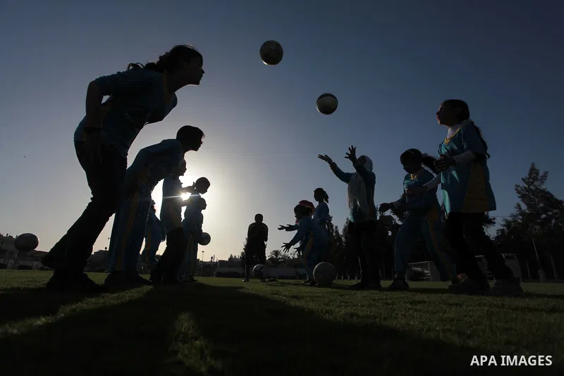 Palestinian girls take part in a training session at the Beit Lahia football club in the northern Gaza strip, on April 30, 2014 as part of an after-school sport program funded by the Palestine Association for Children s...