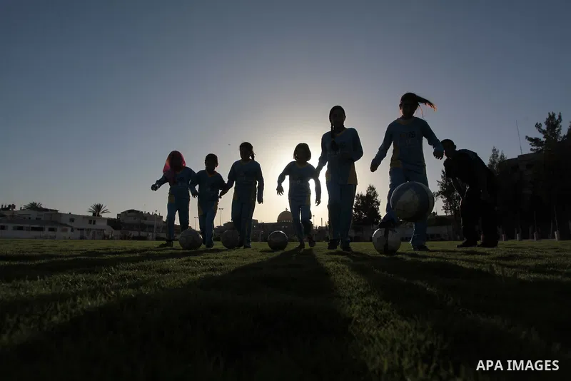 Palestinian girls take part in a training session at the Beit Lahia football club in the northern Gaza strip, on April 30, 2014 as part of an after-school sport program funded by the Palestine Association for Children s...