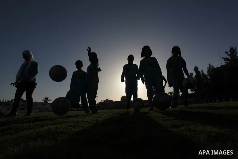 Palestinian girls take part in a training session at the Beit Lahia football club in the northern Gaza strip, on April 30, 2014 as part of an after-school sport program funded by the Palestine Association for Children s...