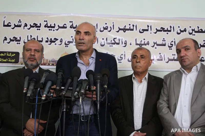 Members of the Freedoms Committee, which includes Fatah, Hamas and others Palestinian movements, meet to follow up the implementation of the reconciliation steps, in Gaza City, on April 30, 2014. Israeli cabinet minister...