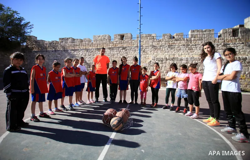 Palestinian girls attend a basketball training in Jerusalem's Old City, April 30, 2014. The team is the first women's team belonging to the sons of Jerusalem club, and consists of about 70 girl between the ages of 10 to...