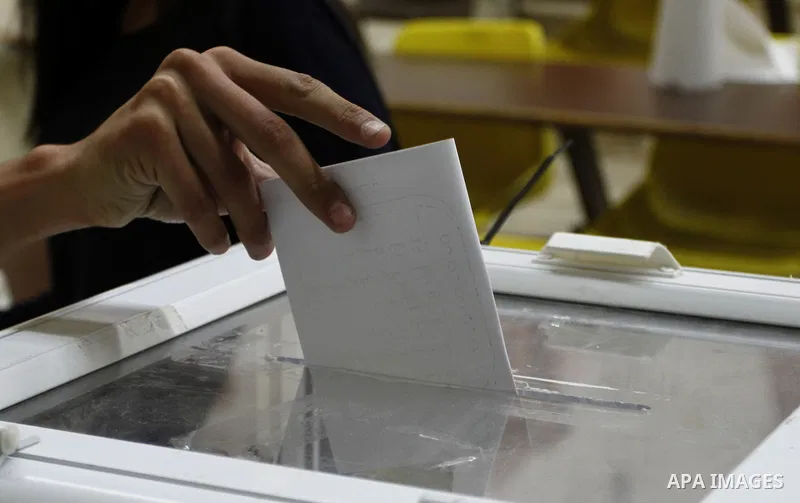 A Palestinian student of BirZeit University casts their ballots during the Student Council elections, on the outskirts of the city of Ramallah in the West Bank on May 7, 2014. The Student Council elections, will pit stud...