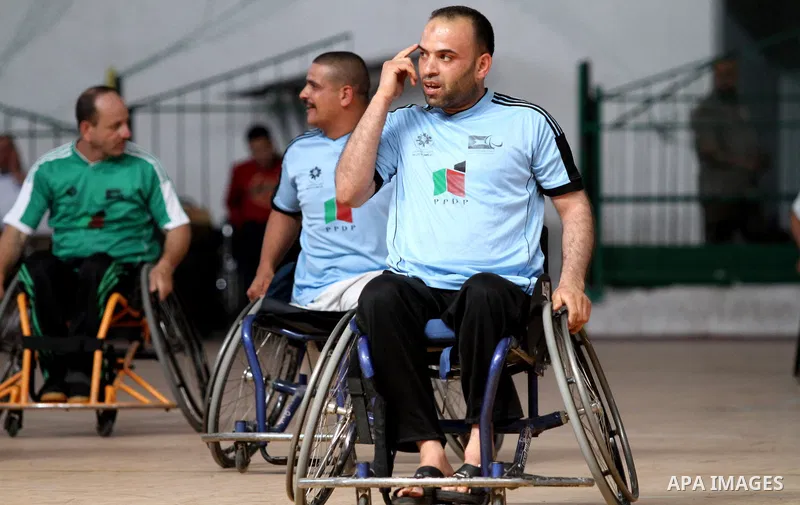 Disabled Palestinian basketball players take part in a game in Gaza City, on May 12, 2014. Photo by Alaa Shamaly