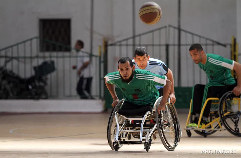 Disabled Palestinian basketball players take part in a game in Gaza City, on May 12, 2014. Photo by Alaa Shamaly