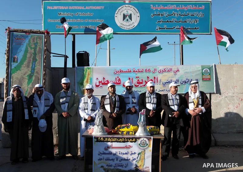 Palestinians attend the final conference of the national marathon on the eve of the 66th anniversary of the "Nakba" in the northern Gaza Strip on May 14, 2014. "Nakba" means in Arabic "catastrophe" in reference to the bi...