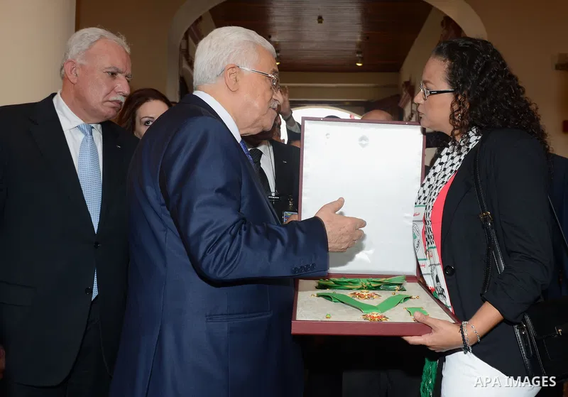 Venezuelan President, Nicolas Maduro, recieves from Palestine President, Mahmud Abbas the Palestine Star, maximun recognition that gives his country, in Miraflores Palace, in Caracas, Venezuela, on May 16, 2014. Mahmud A...