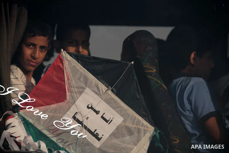 Palestinian children fly kites to mark the Nakba or the ''Day of Catastrophe'' in Beit Hanoun in the northern Gaza Strip, on May 17, 2014.Palestinians marked ''Nakba'' to commemorate the expulsion or fleeing of some 700,...
