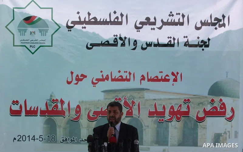 Palestinian Deputy, Ahmed Abu Halabiyeh speaks during a press conference during a protest to against the Judaization of Al-Aqsa at the Legislative Council in Gaza City on May 18, 2014. Photo by Ashraf Amra