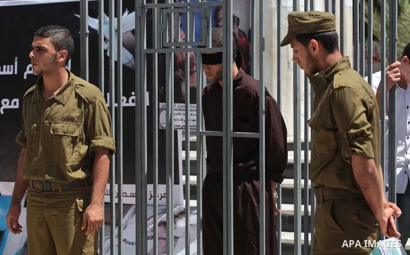 Palestinian youths take part a protest to solidarity with Palestinian prisoners on hunger strike in Israeli jails in Gaza City on May 19, 2014. Israel had refused to release as promised a last group of Palestinian prison...