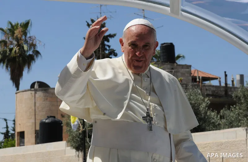Pope Francis attends an open-air mass in the Manger Square, next to the Nativity Church in the West Bank town of Bethlehem May 25, 2014. Pope Francis made an impassioned plea for peace on a pilgrimage on Sunday to Bethle...