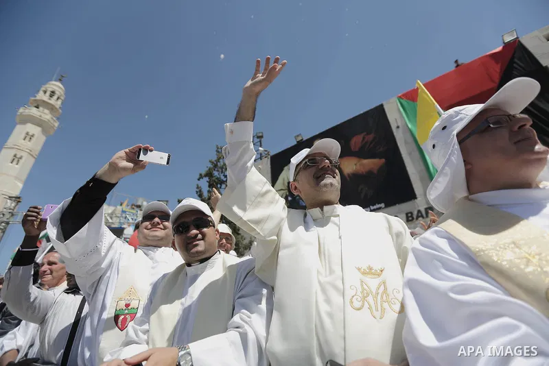 Pope Francis celebrates a mass in Manger Square next to the Church of the Nativity, in the West Bank city of Bethlehem May 25, 2014. Pope Francis arrived in the West Bank on Sunday to start the most delicate part of his...