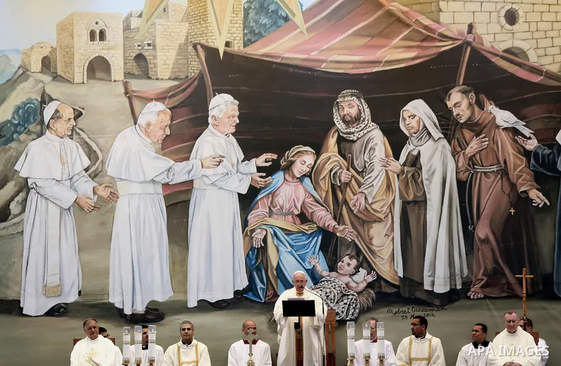 Pope Francis celebrates a mass in Manger Square next to the Church of the Nativity, in the West Bank city of Bethlehem May 25, 2014. Pope Francis arrived in the West Bank on Sunday to start the most delicate part of his...