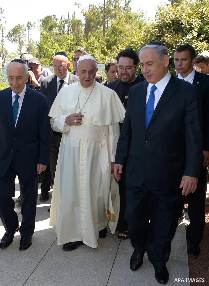 Pope Francis visits the Yad Vashem Holocaust Museum in Jerusalem, attended by Israeli President Shimon Peres and Prime Minister Benjamin Netanyahu on May 26, 2014. In his first Middle East tour since his anointment in 20...