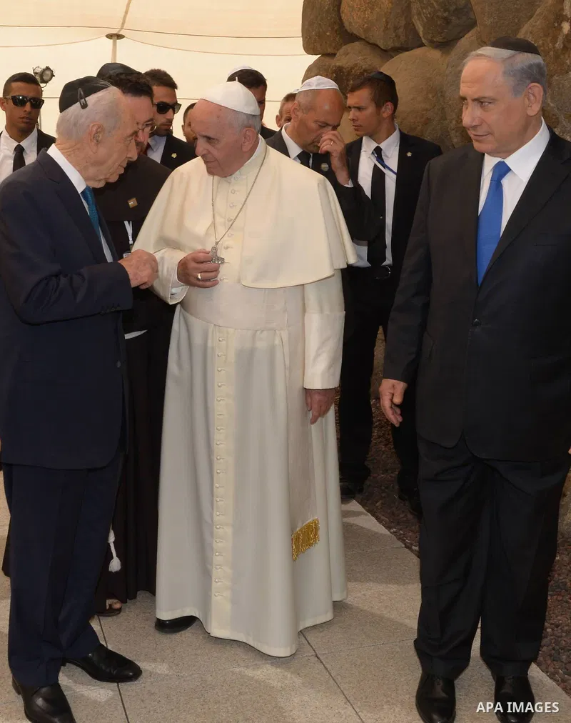 Pope Francis visits the Yad Vashem Holocaust Museum in Jerusalem, attended by Israeli President Shimon Peres and Prime Minister Benjamin Netanyahu on May 26, 2014. In his first Middle East tour since his anointment in 20...
