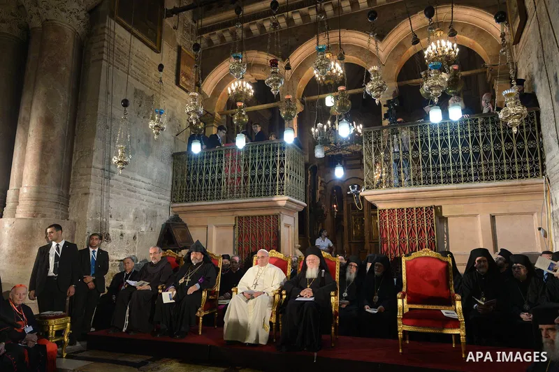 Pope Francis prays at the Church of the Holy Sepulchre in the Old City of Jerusalem on May 25, 2014. In his first Middle East tour since his anointment in 2013, Pope Francis held a historic prayer service with the Ecumen...