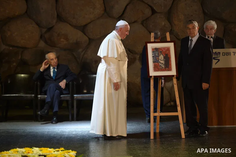 Pope Francis visits the Yad Vashem Holocaust Museum in Jerusalem, attended by Israeli President Shimon Peres and Prime Minister Benjamin Netanyahu on May 26, 2014. In his first Middle East tour since his anointment in 20...