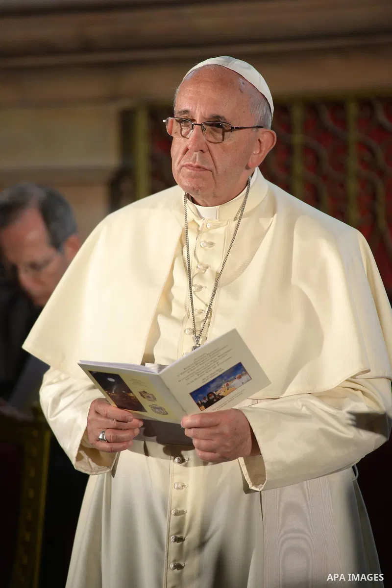 Pope Francis prays at the Church of the Holy Sepulchre in the Old City of Jerusalem on May 25, 2014. In his first Middle East tour since his anointment in 2013, Pope Francis held a historic prayer service with the Ecumen...