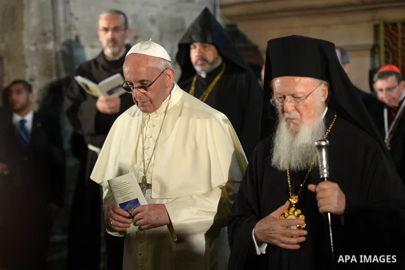 Pope Francis prays at the Church of the Holy Sepulchre in the Old City of Jerusalem on May 25, 2014. In his first Middle East tour since his anointment in 2013, Pope Francis held a historic prayer service with the Ecumen...