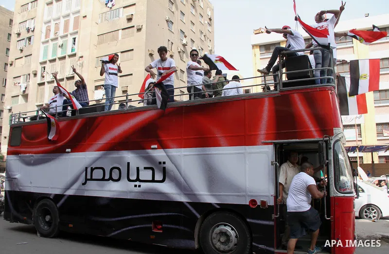 Egyptians celebrate during a rally to support Presidential candidate and former army chief Abdel Fattah al-Sisi in Cairo, May 26, 2014. Egyptians begin voting in a new presidential election which ex-army chief Abdel Fatt...