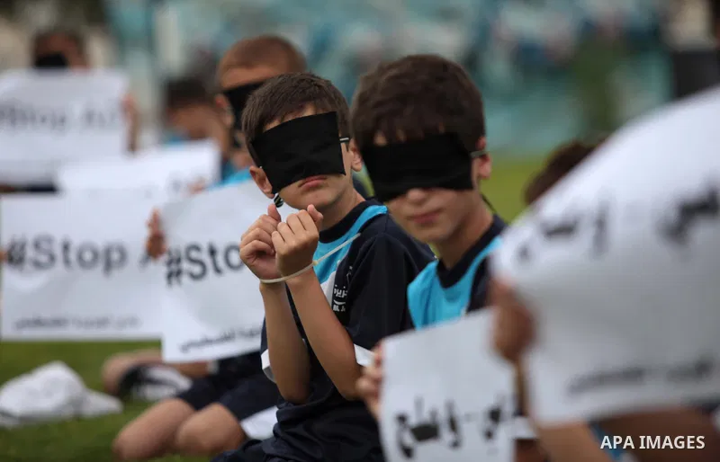 Palestinian children take part in a demonstration to show solidarity with Palestinian prisoners held in Israeli jails, in Gaza city on May 28, 2014. Some 120 Palestinians jailed without trial in Israel have been on an op...