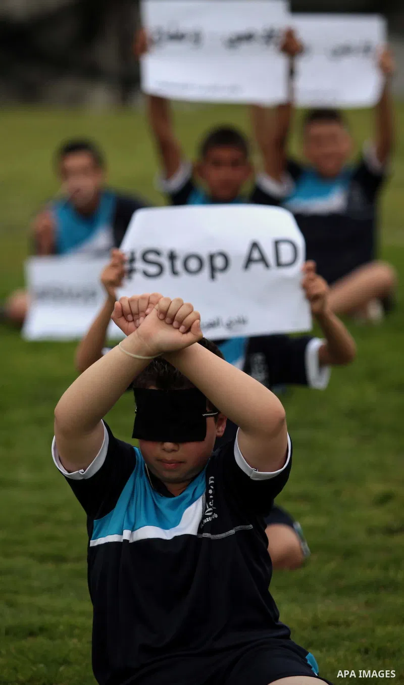 Palestinian children take part in a demonstration to show solidarity with Palestinian prisoners held in Israeli jails, in Gaza city on May 28, 2014. Some 120 Palestinians jailed without trial in Israel have been on an op...