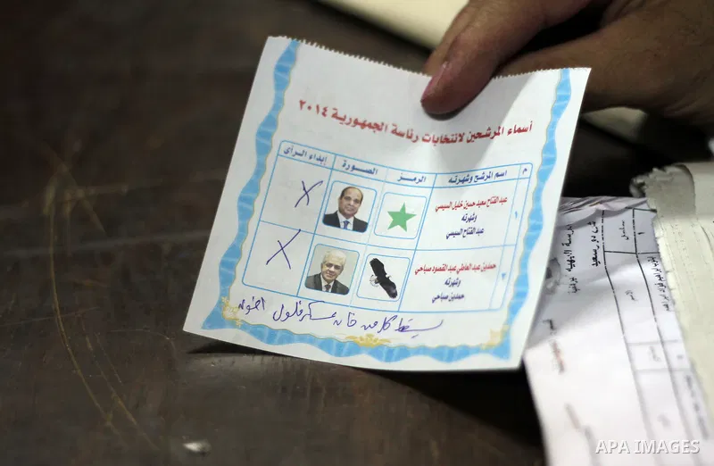 Egyptian election workers count ballots at the end of the third day of voting in the presidential elections, at a polling station in Cairo, Egypt, 28 May 2014. Polling stations opened on 28 May for the final day of the v...