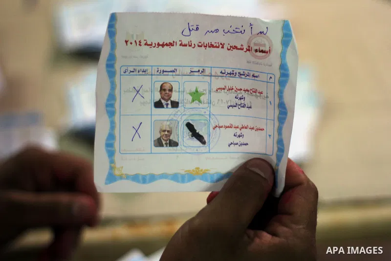 Egyptian election workers count ballots at the end of the third day of voting in the presidential elections, at a polling station in Cairo, Egypt, 28 May 2014. Polling stations opened on 28 May for the final day of the v...