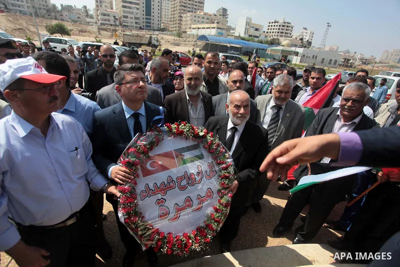 Turkish ambassador in Palestine Mustafa Sarnic and deputy President of the Palestinian Legislative Council Ahmed Bahr lay a wreath during a rally ahead of the 4th anniversary of the Mavi Marmara Gaza flotilla incident, a...
