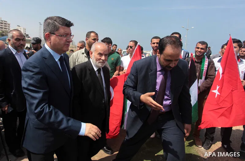Turkish ambassador in Palestine Mustafa Sarnic and deputy President of the Palestinian Legislative Council Ahmed Bahr take part in a rally ahead of the 4th anniversary of the Mavi Marmara Gaza flotilla incident, at the s...