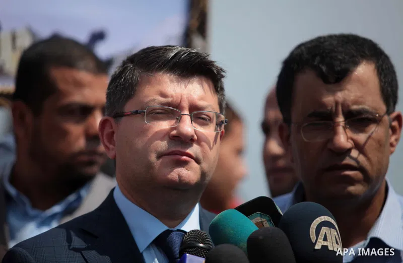Turkish ambassador in Palestine Mustafa Sarnic speaks in a press conference during a rally ahead of the 4th anniversary of the Mavi Marmara Gaza flotilla incident, at the seaport of Gaza City May 29, 2014. Nine activists...