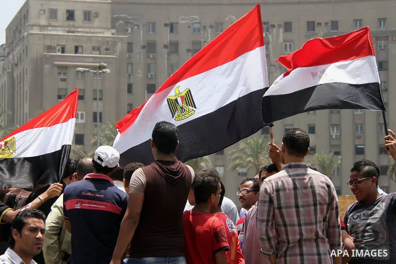 Egyptian supporters of Abdel Fattah al-Sisi celebrate at Tahrir square in Cairo May 29, 2014. Initial poll count on Wednesday showed that Egypt's former military chief Abdel Fattah al-Sisi would get a landslide victory i...
