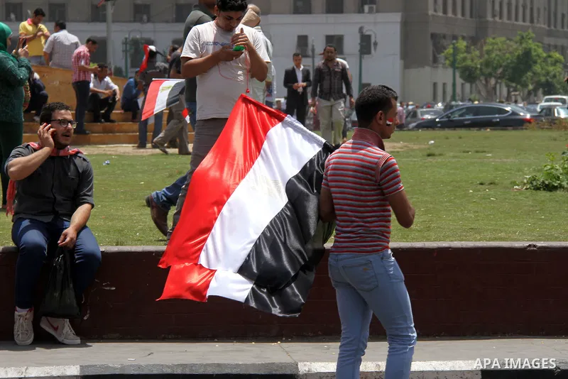 Egyptian supporters of Abdel Fattah al-Sisi celebrate at Tahrir square in Cairo May 29, 2014. Initial poll count on Wednesday showed that Egypt's former military chief Abdel Fattah al-Sisi would get a landslide victory i...