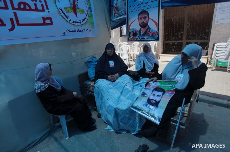 Relatives of hunger strike Palestinian prisoners of Israeli jails stay at a tent in front of Red cross office in Gaza City, to solidarity with Palestinian prisoners, on May 29, 2014. It was about 120 Palestinians impriso...