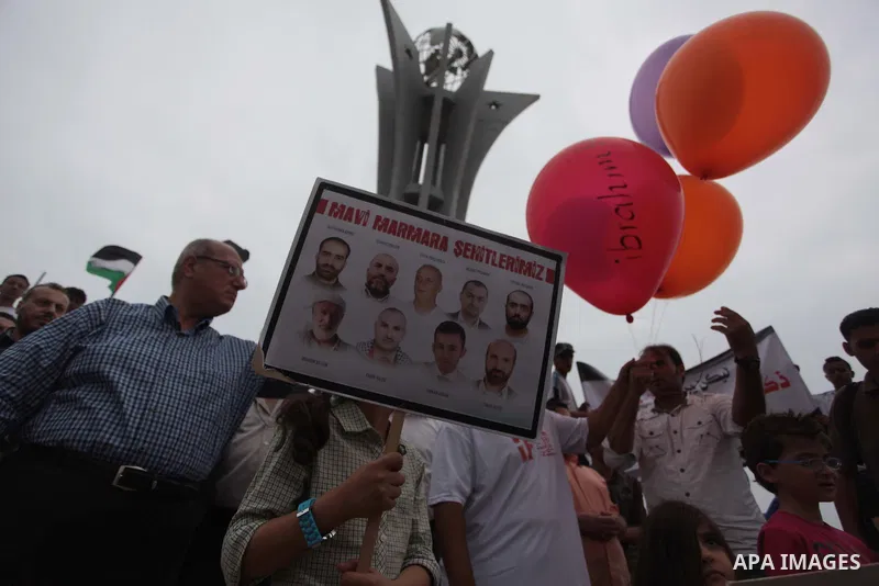 Palestinians hold balloons during a rally on the fourth anniversary of the Mavi Marmara Gaza flotilla incident, at the seaport of Gaza City May 31, 2014. Eight Turks and a Turkish-American, died in an Israeli commando ra...