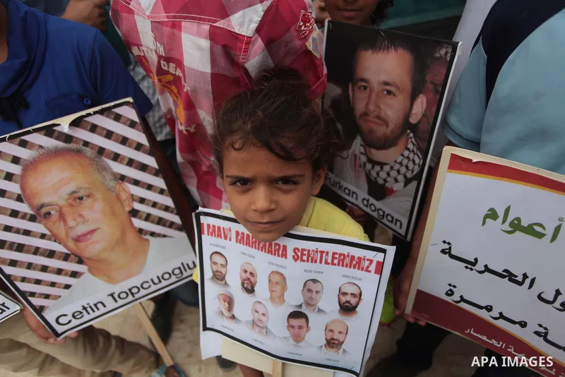 Palestinians take part a rally on the fourth anniversary of the Mavi Marmara Gaza flotilla incident, at the seaport of Gaza City May 31, 2014. Eight Turks and a Turkish-American, died in an Israeli commando raid on the M...