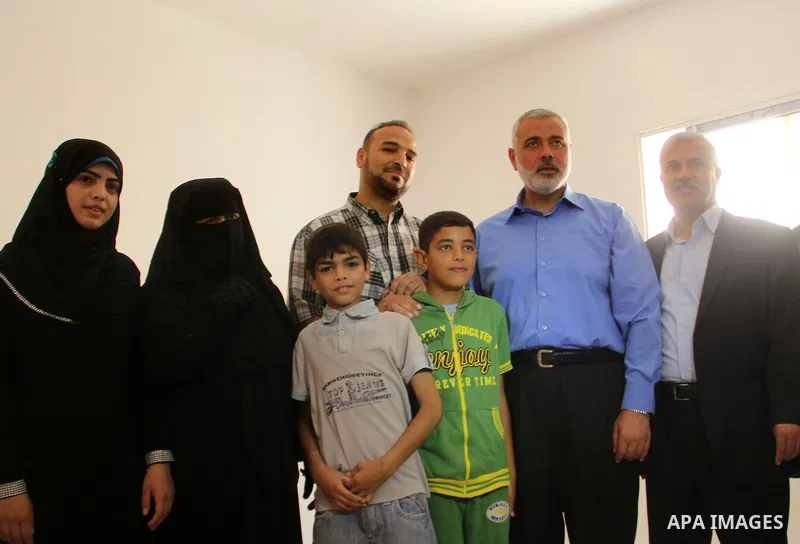 Palestinian Prime Minister in Gaza strip, Ismail Haniyeh attends the opening of the Saudi neighborhood 'Saud 2' at Rafah in southern Gaza Strip, on May 31, 2014. Saudi Fund for Development handed over the 762 housing uni...