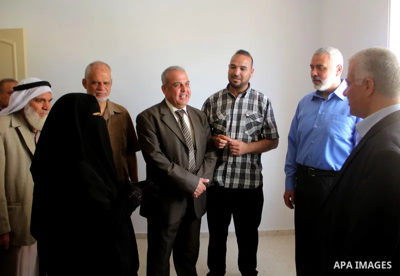 Palestinian Prime Minister in Gaza strip, Ismail Haniyeh attends the opening of the Saudi neighborhood 'Saud 2' at Rafah in southern Gaza Strip, on May 31, 2014. Saudi Fund for Development handed over the 762 housing uni...