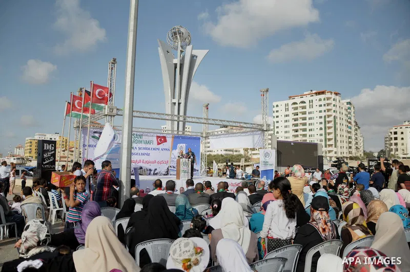 Palestinians take part a celebrate to mark the fourth anniversary of the Mavi Marmara Gaza flotilla incident, organized by the Turkish humanitarian relief IHH, at the seaport of Gaza City May 31, 2014. Eight Turks and a...