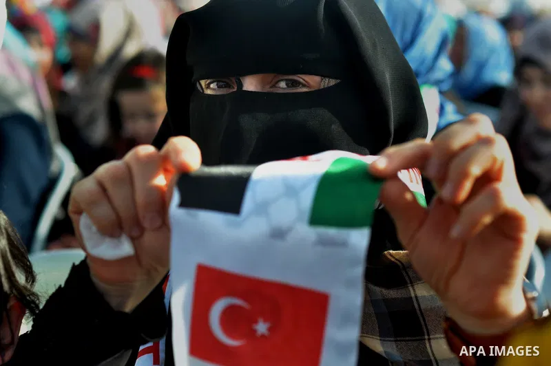 Palestinians take part a celebrate to mark the fourth anniversary of the Mavi Marmara Gaza flotilla incident, organized by the Turkish humanitarian relief IHH, at the seaport of Gaza City May 31, 2014. Eight Turks and a...