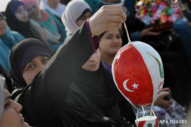 Palestinians take part a celebrate to mark the fourth anniversary of the Mavi Marmara Gaza flotilla incident, organized by the Turkish humanitarian relief IHH, at the seaport of Gaza City May 31, 2014. Eight Turks and a...