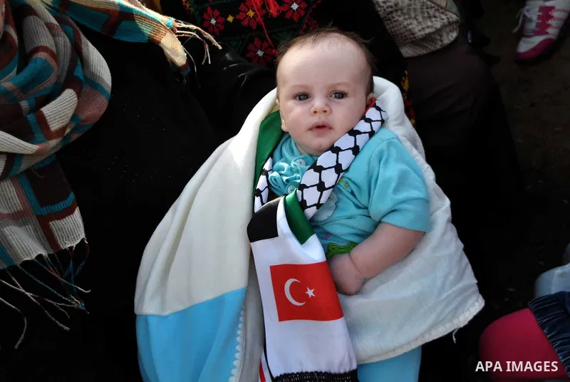 Palestinians take part a celebrate to mark the fourth anniversary of the Mavi Marmara Gaza flotilla incident, organized by the Turkish humanitarian relief IHH, at the seaport of Gaza City May 31, 2014. Eight Turks and a...