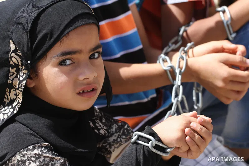 Palestinians take part a protest to solidarity with Palestinian prisoners, at a tent near Erez crossing in the northern Gaza Strip on June 01, 2014. It was about 120 Palestinians imprisoned without trial in Israel on an...