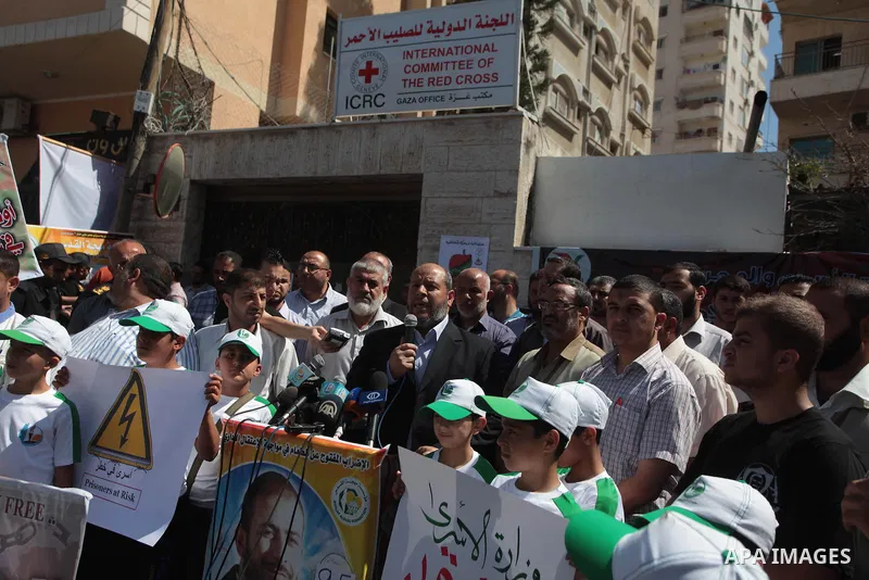 Palestinian Hamas official Khalil al-Hayya speaks during a rally to show solidarity with Palestinian prisoners held in Israeli jails, in front of Red cross office in Gaza City June 2, 2014. Some 120 Palestinians jailed w...