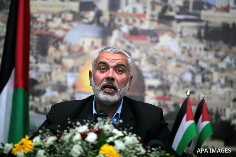 Senior Hamas leader Ismail Haniyeh speaks to media before leaving his office as a former Hamas government Prime Minister, in Gaza City June 2, 2014. President Mahmoud Abbas swore in a Palestinian unity government on Mond...
